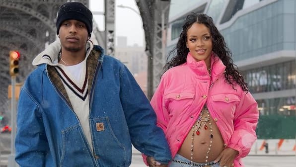 Rihanna expecting first child with A$AP Rocky, flaunts baby bump during a stroll