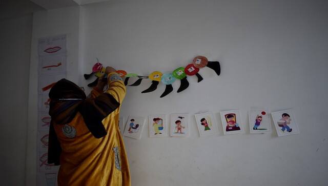  A therapist at a specialized treatment centre in Kashmir readying the props for a special class as schools gear up to open again. Image courtesy: Mudasir Rawloo