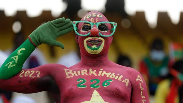Burkina Faso's fan before the African Cup of Nations 2022 Third place soccer match between Burkina Faso and Cameroon at the Ahmadou Ahidjo stadium in Yaounde, Cameroon, Saturday, Feb. 5, 2022. (AP Photo/Sunday Alamba).Saturday, Feb. 5, 2022. (AP Photo/Sunday Alamba)