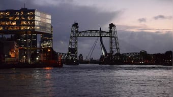 Angry locals plan to pelt Jeff Bezos' superyacht with rotten eggs if iconic Rotterdam bridge dismantled
