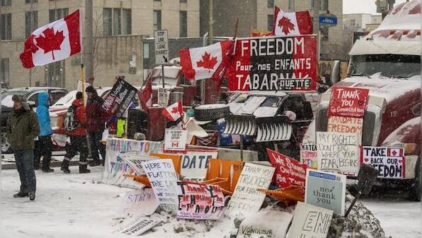 Canadian truckers protest: Standoff at Ambassador Bridge eases as demonstrations ramped up across cities