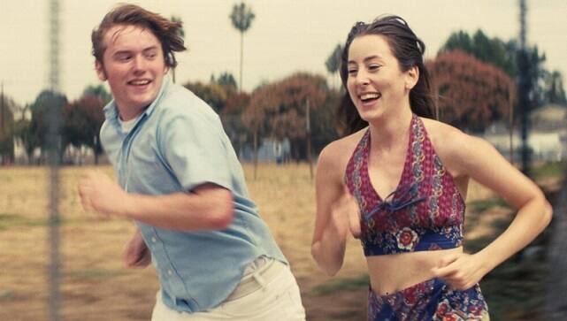 Alana Haim and Cooper Hoffman in Licorice Pizza