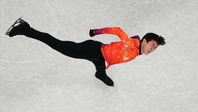 Nathan Chen, of the United States, competes in the men's free skate program during the figure skating event at the 2022 Winter Olympics, Thursday, Feb. 10, 2022, in Beijing. (AP Photo/Jeff Roberson)