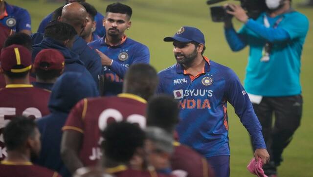 India's captain Rohit Sharma, right, greets members of West Indies team after India won the third Twenty20 international cricket match in Kolkata, India, Sunday, Feb. 20, 2022. AP