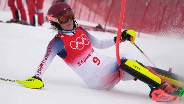 Mikaela Shiffrin of the United States crashes out during the women's combined slalom at the 2022 Winter Olympics, Thursday, Feb. 17, 2022, in the Yanqing district of Beijing. (AP Photo/Robert F. Bukaty)