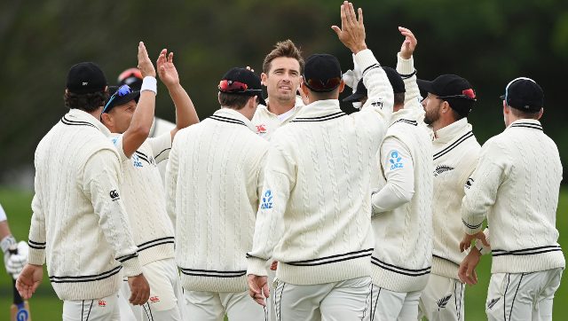 New Zealand's Tim Southee celebrates with team mates the wicket of Sarel Erwee. AP