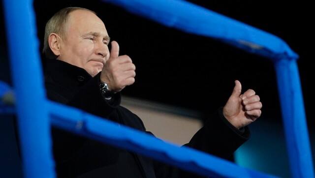 FILE- Russian President Vladimir Putin attends the opening ceremony of the 2022 Winter Olympics, Friday, Feb. 4, 2022, in Beijing. Be it sports, politics, hacking or war, the recent history of Russia's relationship with the world can be summed up in one phrase: They get away with it. (AP Photo/Sue Ogrocki, File)
