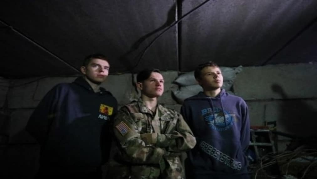 Ukrainian teenager Mykhailo Anopa had been suffering sleepless nights worrying about a full-on attack from Russia. Then he decided to do something about it, AFP reported. The 15-year-old joined other boys from disadvantaged families digging trenches for soldiers serving on his country's eastern front and facing off with Russian-backed separatists. Image Courtesy: AFP