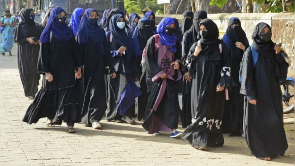 Hijab row: Students wearing burqas protest as Karnataka colleges reopen after a week