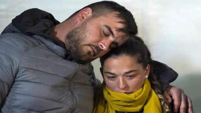 File image of parents of two-year-old Julen Rosello hugging in Totalan, southern Spain. - Miners were lowered on a cage to rescue two-year-old Julen Rosello who fell down a narrow shaft on January 13 as he was playing while his parents prepared a picnic in Totalan. AFP