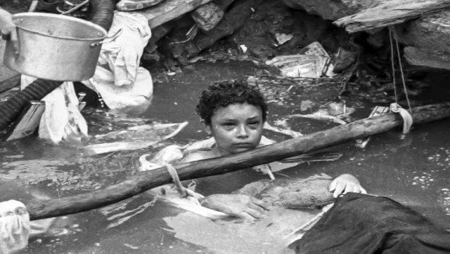File image of Colombian Omayra Sanchez trapped in Armero, Colombia on 15 November, 1985. The girl was trapped for more than 60 hours following the eruption of the Nevado Del Ruiz volcano and finally died on 16 November. AFP