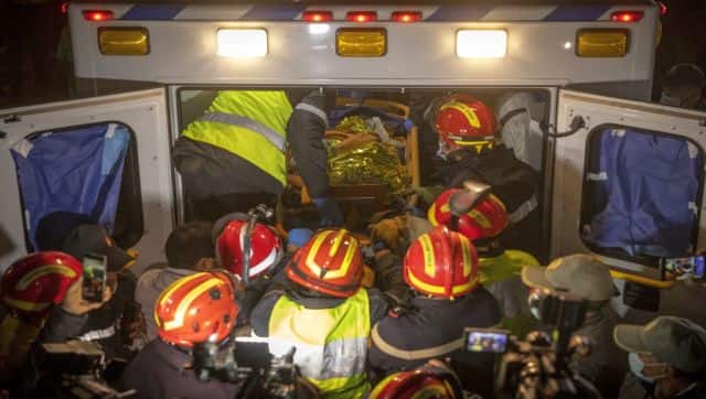 File image of Moroccan emergency services teams carrying five-year-old Rayan Oram into an ambulance after pulling him from a well shaft he fell into on 1 February, in the remote village of Ighrane in the rural northern province of Chefchaouen. AFP