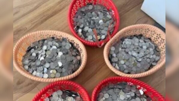 Assam man buys scooter with sack full of coins kept as savings; watch viral video here