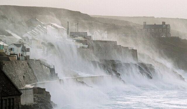 Waves hits Porthleven on the Cornish coast, Britain, as Storm Eunice makes landfall. (AP)