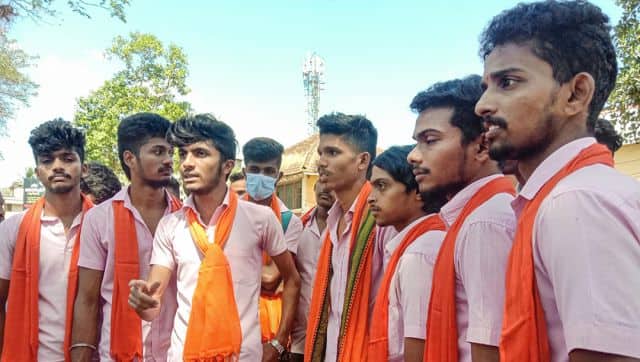 Students wear saffron scarves to protest against Muslim girl students wearing hijab to school, in Kundapura of Udupi district. PTI