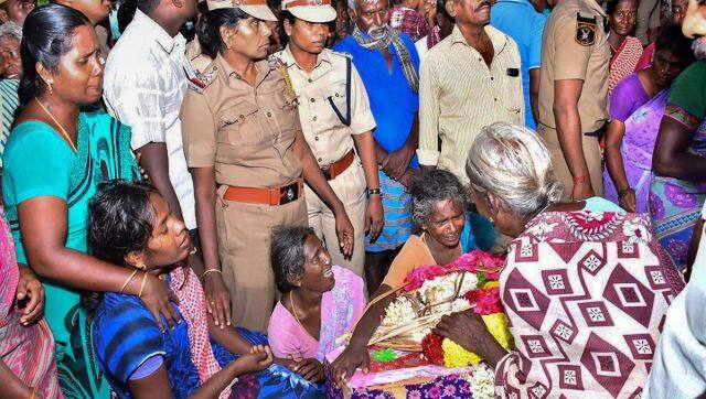Family members and relatives mourn near the mortal remains of Sujith Wilson before his funeral in Tiruchirappalli. PTI