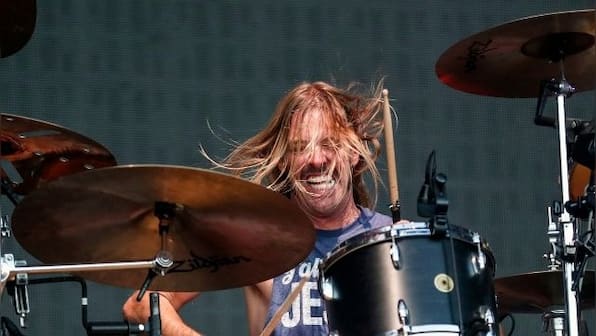 Taylor Hawkins, drummer of Foo Fighters for 25 years, dies at 50