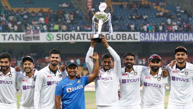 Some of the Team India players pose with the Test series trophy. Sportzpics 
