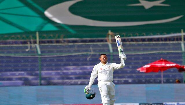 Australia’s Usman Khawaja celebrates after completing his century during Day 1 of second Test between Pakistan and Australia at the National Stadium, in Karachi, Pakistan, on Saturday. AP 