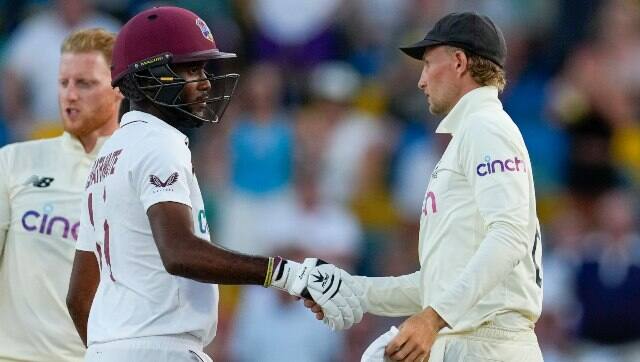 England's captain Joe Root, right, shakes hands with West Indies' captain Kraigg Brathwaite at the end of second Test. AP