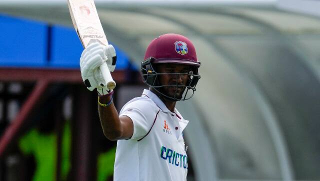 West Indies captain Kraigg Brathwaite raises his bat on his way back to the pavilion after being dismissed for 160 on Day 4 of the second Test against England. AP