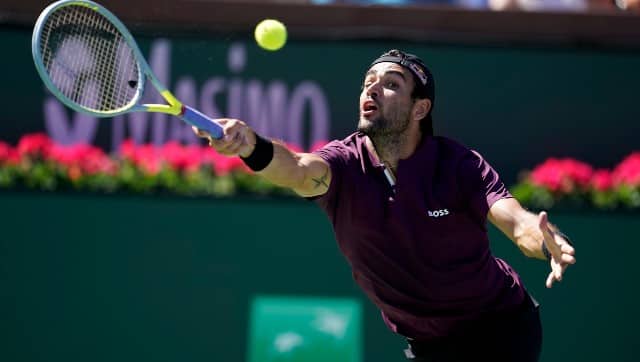 Matteo Berrettini, of Italy, returns a shot against Lloyd Harris, of South Africa, at the BNP Paribas Open tennis tournament. AP