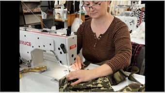 From wedding gowns to army assault vests, Ukraine’s top bridal fashion brand does it all