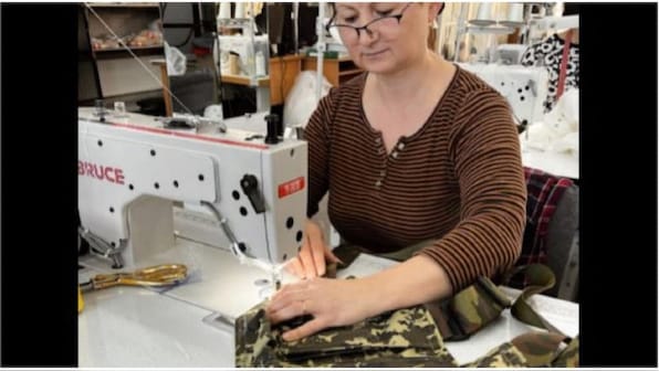 From wedding gowns to army assault vests, Ukraine’s top bridal fashion brand does it all
