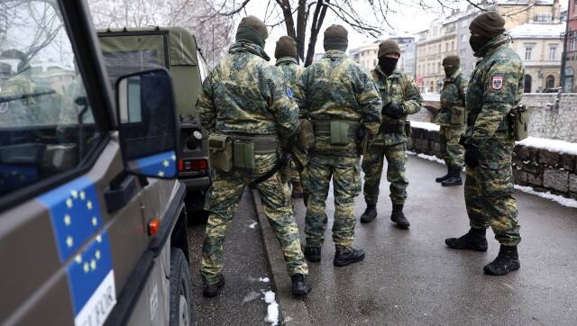 Austrian NATO peacekeeping EUFOR troops stop as they patrol in downtown Sarajevo, Bosnia, Monday March 7, 2022. For some European countries watching Russia's bloody invasion of Ukraine, there are fears that they could be next. Western officials say the most vulnerable could be those who are not members of the NATO military alliance or the European Union, and thus alone and unprotected — including Ukraine’s neighbor Moldova and Russia's neighbor Georgia, both of them formerly part of the Soviet Union — along with the Balkan states of Bosnia and Kosovo. (AP Photo/Armin Dorgut)