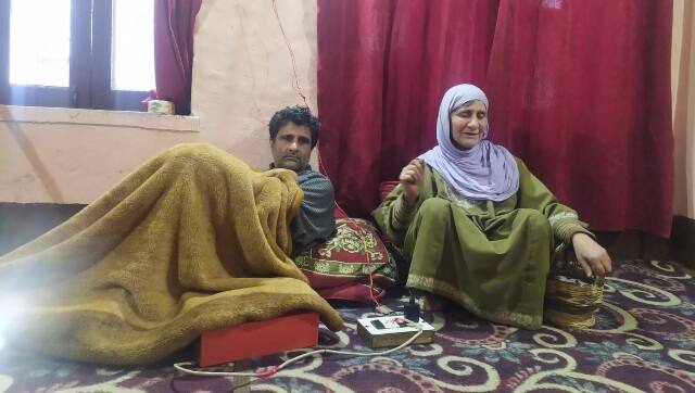 Irshad Ahmad Sheikh with his mother, Jalla. Image by Farzana Nisar