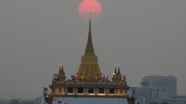 Cashless and flightless, Russian tourists stuck in Thailand