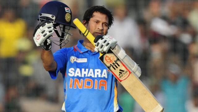 Sachin Tendulkar reacts after scoring his hundredth hundred century. AFP