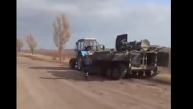 Watch|Ukrainian farmer tows Russian tank amid military invasion, see light-hearted video here Watch|Ukrainian farmer tows Russian tank amid military invasion, see light-hearted video here