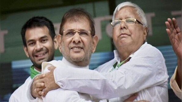 LJD merges with RJD; first step towards formation of united Opposition, says Sharad Yadav