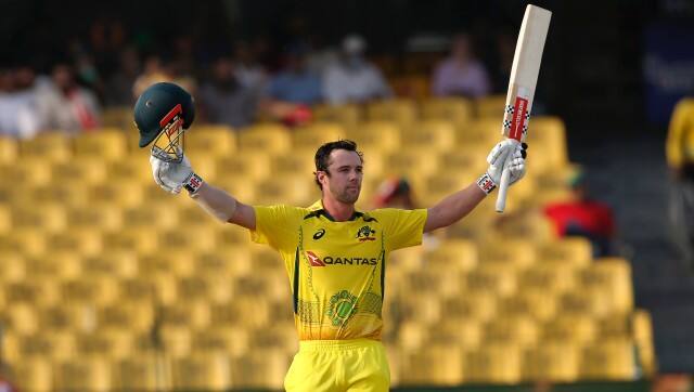 Australia's Travis Head celebrates after completing century during the first One Day International cricket match between Pakistan and Australia at Gaddafi Stadium in Lahore, Pakistan, Tuesday, March 29, 2022. (AP Photo/K.M. Chaudary)