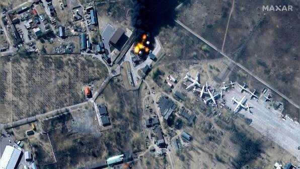 Russian warplanes, artillery widen assault on Ukraine, hit major industrial hub and airfields