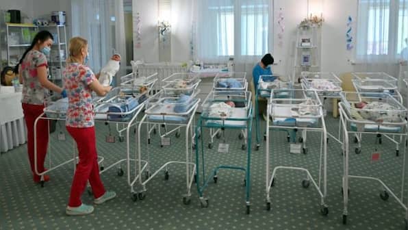 Russian invasion hits Ukraine’s booming surrogacy industry. What happens to birth mothers and their babies?