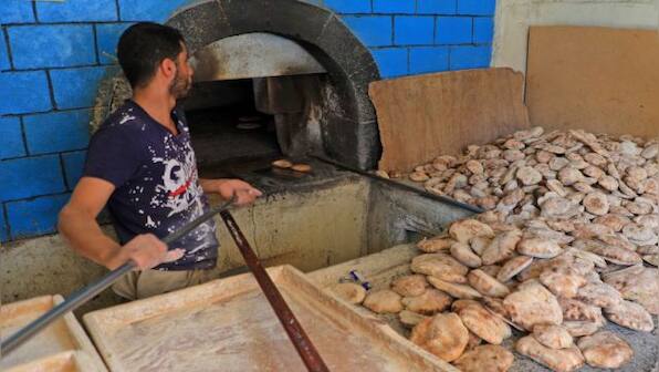 United States and Russia clash over cause of food price rises