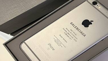 Luxury fashion brand Balenciaga uses smashed iPhones to invite guests, receives mixed reviews