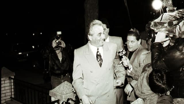 John Gotti, the mafia boss who became known as the Dapper Don, center, followed by Salvatore “Sammy the Bull” Gravano, the right-hand man who later testified against him, in New York. Photo by Steve Berman c.2022 The New York Times Company