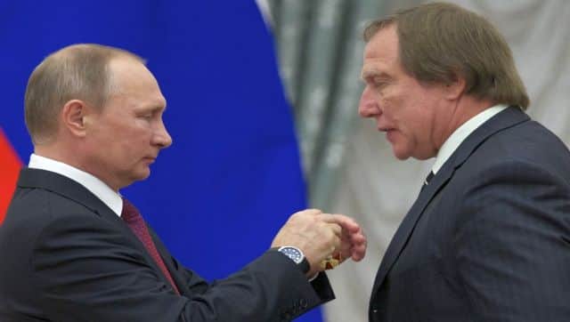 File image of Russian president Vladimir Putin presenting a medal to Russian cellist Sergei Roldugin during an awarding ceremony at the Kremlin. AFP