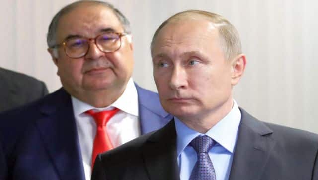 File image of Russian president Vladimir Putin and founder of USM Holdings Alisher Usmanov. AFP