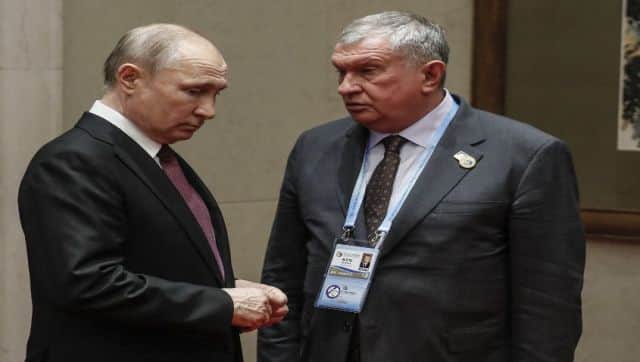 File image of Vladimir Putin with Igor Sechin (R), chief executive officer and chairman of the management board and deputy chairman of the board of directors of Russian energy company Rosneft. AFP