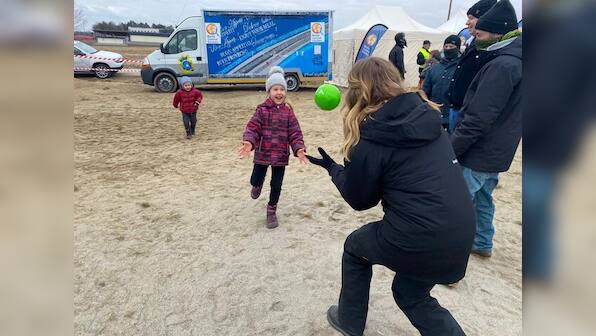 Ukrainian kid interrupts reporter's live at Poland border; watch adorable video here