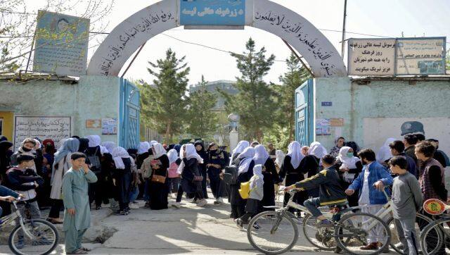 Girls leave their school following order of closure just hours after reopening in Kabul. Afghanistan's Taliban rulers decided against opening schools to girls above the sixth grade, reneging on a previous promise and opting to appease their hardline base at the expense of further alienating the international community. AFP