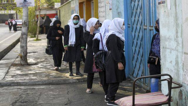 Across the country, groups of jubilant girls had arrived at schools on Wednesday morning carrying their bags and books, greeting their former classmates with grins and chatter. AFP