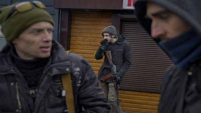 Members of the Ukrainian territorial defense guard a checkpoint in Gorenka, outside the capital Kyiv, Ukraine. AP