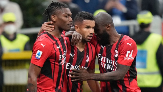 Serie A: AC Milan beat Genoa to hold league summit amid takeover talk Serie A: AC Milan beat Genoa to hold league summit amid takeover talk