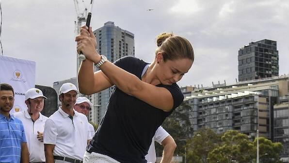 Ashleigh Barty swings back into action, trades tennis for golf