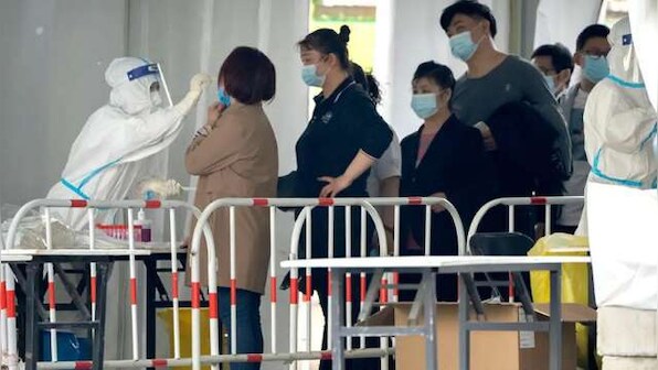 Beijing orders mass COVID-19 testing in 11 districts after 32 turn positive on Monday's nucleic acid tests